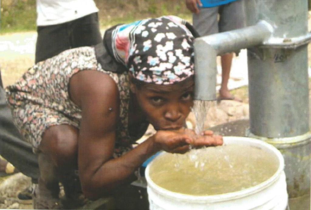 Food for the Poor, Wells Drilled and Pumps Provided  in Leogane, Haiti Through the Donations of the Out-of-Body Travel Foundation.