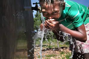 Food for the Poor, Wells Drilled and Pumps Provided  in Caribbean and Latin America Drilled through the Donations of the Out-of-Body Travel Foundation.